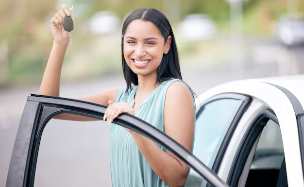 Placeholder text of a modern sedan driving safely on a highway during sunset, representing peace of mind.